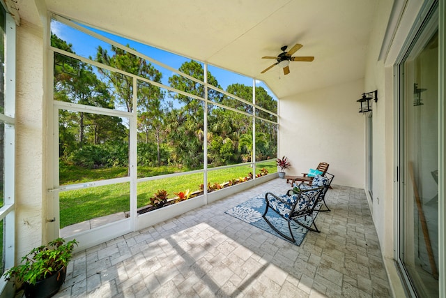 296 NW Toscane Trl, Port Saint Lucie, FL 34986 - unfurnished sunroom with ceiling fan, healthy amount of natural light, and view of scattered trees