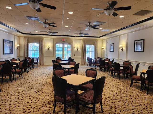 296 NW Toscane Trl, Port Saint Lucie, FL 34986 - dining area featuring ornamental molding, a decorative wall, carpet, plenty of natural light, and ceiling fan