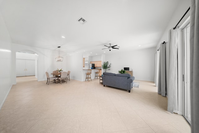 296 NW Toscane Trl, Port Saint Lucie, FL 34986 - living room with arched walkways, recessed lighting, a ceiling fan, and baseboards