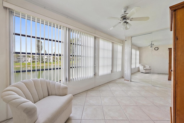 222 Wellington Unit G, West Palm Beach, FL 33417 - sunroom with a water view and tile patterned flooring