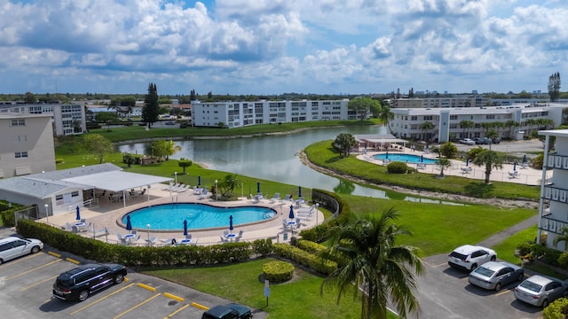 222 Wellington Unit G, West Palm Beach, FL 33417 - drone / aerial view of a pool and a large body of water