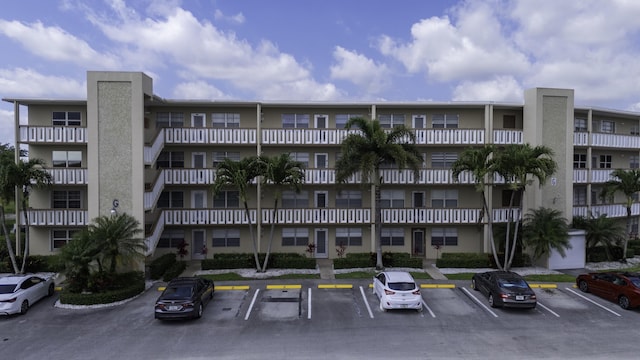 222 Wellington Unit G, West Palm Beach, FL 33417 - view of apartment building / complex with uncovered parking