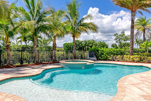 17155 SW Ambrose Way, Port Saint Lucie, FL 34986 - view of pool with a pool with connected hot tub and a patio area