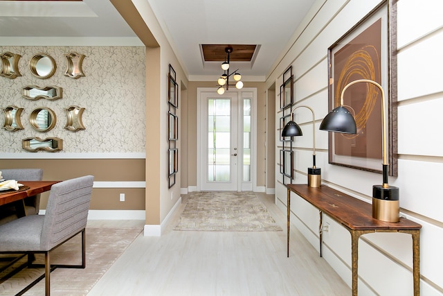 17155 SW Ambrose Way, Port Saint Lucie, FL 34986 - foyer with a tray ceiling, wood finished floors, and french doors
