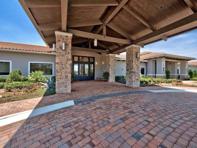 17155 SW Ambrose Way, Port Saint Lucie, FL 34986 - view of patio / terrace featuring french doors