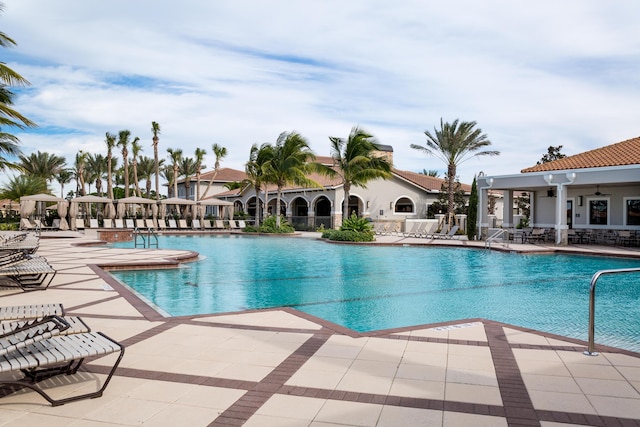 17155 SW Ambrose Way, Port Saint Lucie, FL 34986 - community pool featuring a patio area