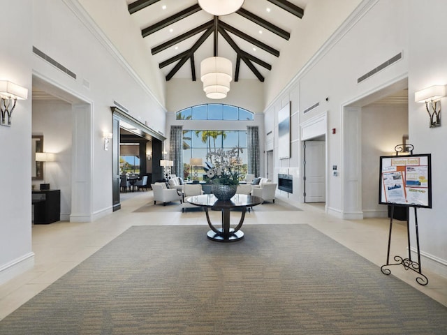 17155 SW Ambrose Way, Port Saint Lucie, FL 34986 - common area featuring high vaulted ceiling, beamed ceiling, and recessed lighting