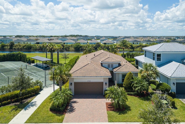 17155 SW Ambrose Way, Port Saint Lucie, FL 34986 - aerial perspective of suburban area with a large body of water