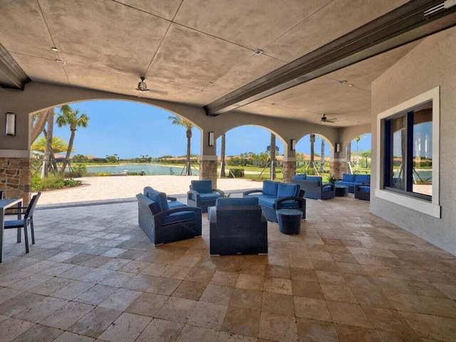 17155 SW Ambrose Way, Port Saint Lucie, FL 34986 - view of patio / terrace with outdoor lounge area and a water view