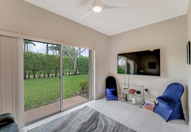 9998 Seacrest Cir Unit C, Boynton Beach, FL 33437 - tiled bedroom featuring access to exterior, ceiling fan, and baseboards