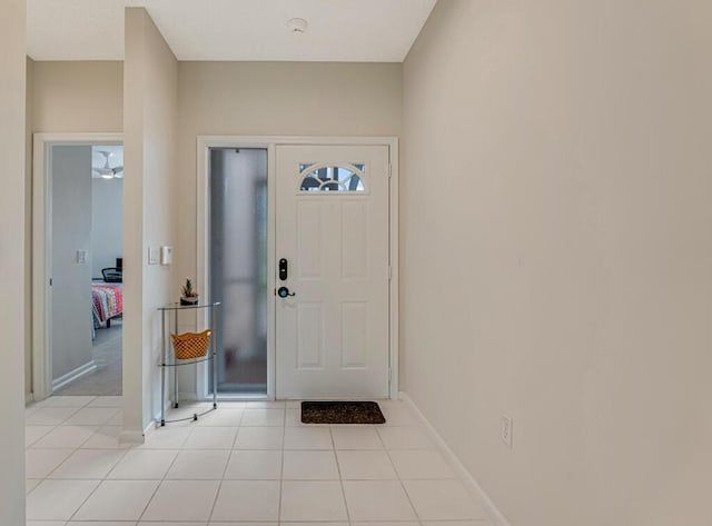 9998 Seacrest Cir Unit C, Boynton Beach, FL 33437 - entryway with baseboards and light tile patterned floors