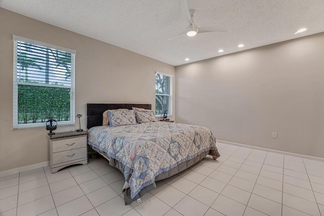 9998 Seacrest Cir Unit C, Boynton Beach, FL 33437 - bedroom featuring a textured ceiling, baseboards, recessed lighting, a ceiling fan, and light tile patterned floors