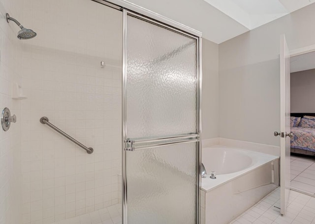 9998 Seacrest Cir Unit C, Boynton Beach, FL 33437 - ensuite bathroom with a stall shower, a garden tub, and tile patterned floors