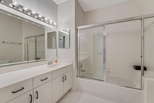 9998 Seacrest Cir Unit C, Boynton Beach, FL 33437 - full bath with vanity, toilet, enclosed tub / shower combo, and tile patterned floors