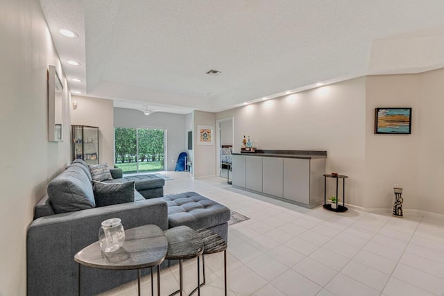 9998 Seacrest Cir Unit C, Boynton Beach, FL 33437 - living area with light tile patterned floors, a textured ceiling, and recessed lighting