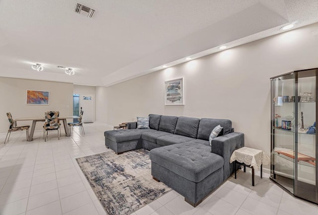 9998 Seacrest Cir Unit C, Boynton Beach, FL 33437 - living area featuring light tile patterned floors, recessed lighting, and baseboards