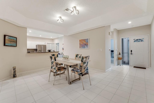 9998 Seacrest Cir Unit C, Boynton Beach, FL 33437 - dining space featuring a textured ceiling, baseboards, and recessed lighting