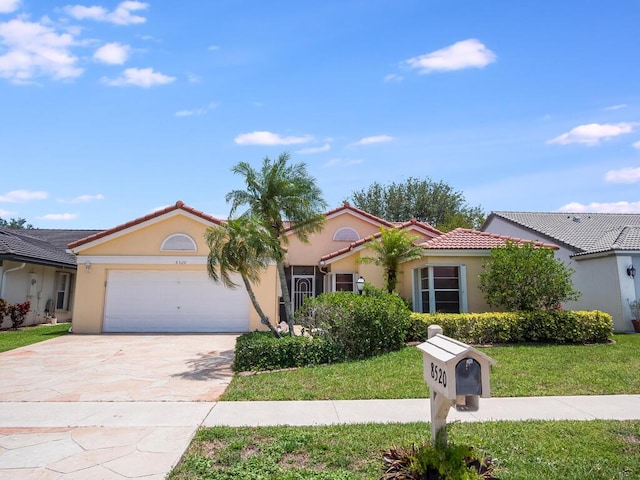 8520 Lake Cypress Rd, Lake Worth, FL 33467 - mediterranean / spanish-style house featuring a tile roof, stucco siding, an attached garage, driveway, and a front lawn