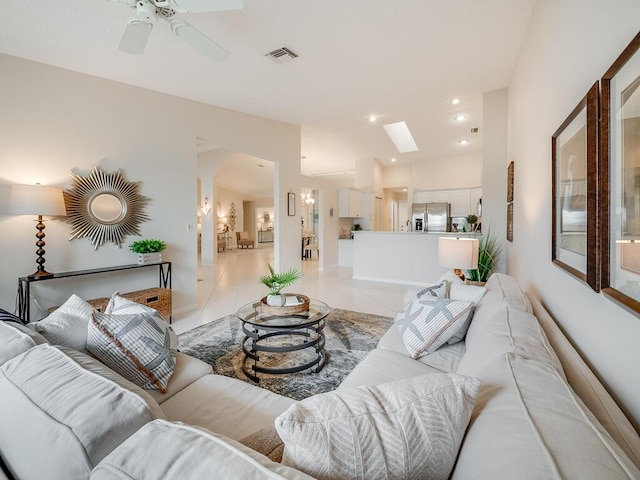 8520 Lake Cypress Rd, Lake Worth, FL 33467 - living room with ceiling fan and arched walkways