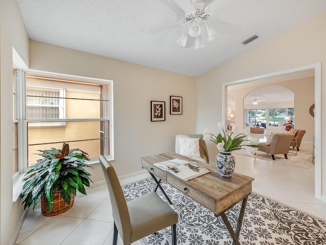 8520 Lake Cypress Rd, Lake Worth, FL 33467 - living area featuring ceiling fan, tile patterned flooring, baseboards, and lofted ceiling