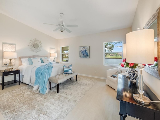 8520 Lake Cypress Rd, Lake Worth, FL 33467 - bedroom with light wood-type flooring, baseboards, and a ceiling fan