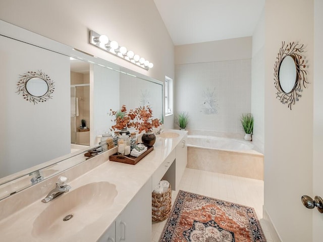 8520 Lake Cypress Rd, Lake Worth, FL 33467 - bathroom with double vanity, lofted ceiling, a bath, tile patterned floors, and an enclosed shower