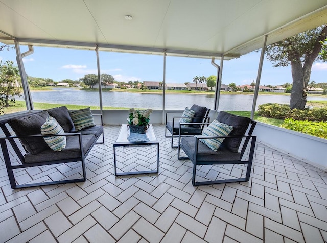 8520 Lake Cypress Rd, Lake Worth, FL 33467 - sunroom / solarium with outdoor lounge area, a water view, and healthy amount of natural light