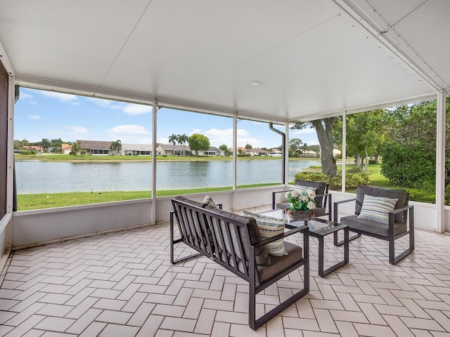 8520 Lake Cypress Rd, Lake Worth, FL 33467 - sunroom / solarium with a water view, an outdoor hangout area, and plenty of natural light