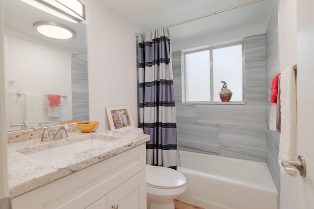 3000 Lake Osborne Dr Unit 103, Lake Worth Beach, FL 33461 - bathroom featuring vanity, toilet, and shower / bath combo with shower curtain
