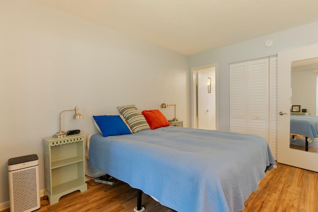 3000 Lake Osborne Dr Unit 103, Lake Worth Beach, FL 33461 - bedroom with wood finished floors and a closet