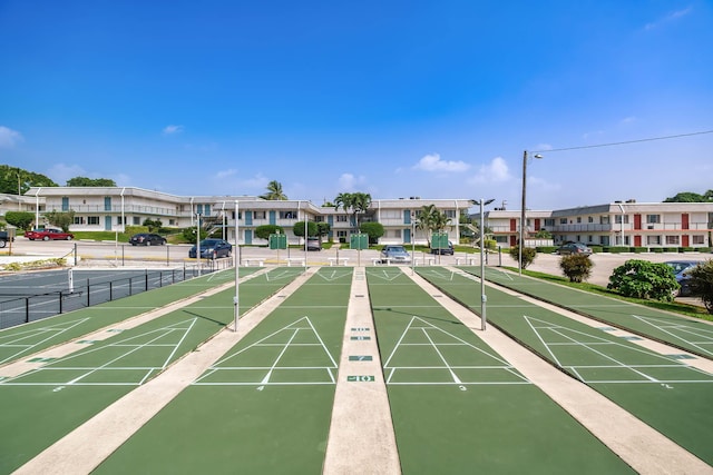 3000 Lake Osborne Dr Unit 103, Lake Worth Beach, FL 33461 - surrounding community with shuffleboard and a residential view