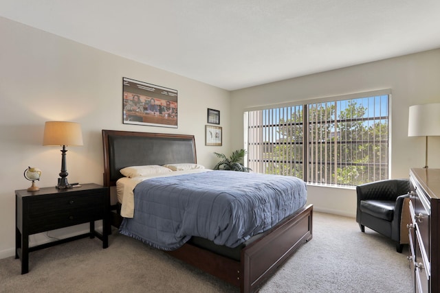 2751 N Palm Aire Dr Unit 304, Pompano Beach, FL 33069 - bedroom with light carpet and baseboards