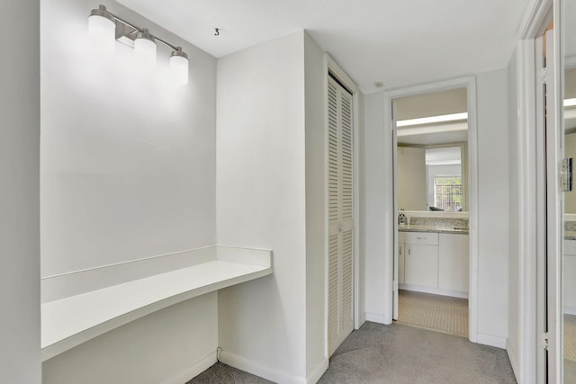 2751 N Palm Aire Dr Unit 304, Pompano Beach, FL 33069 - hallway with baseboards