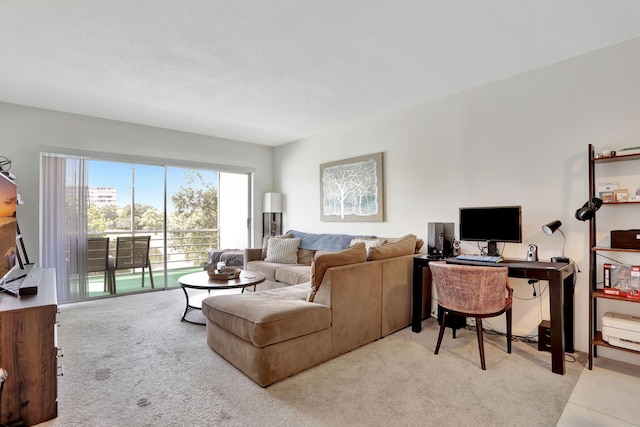 2751 N Palm Aire Dr Unit 304, Pompano Beach, FL 33069 - living area featuring light colored carpet and a desk