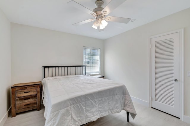 305 Vanderbilt Dr, Lake Worth Beach, FL 33460 - bedroom featuring baseboards, wood finished floors, and a ceiling fan