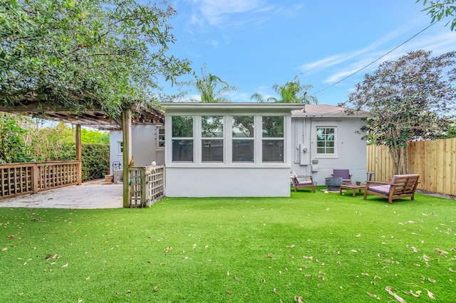305 Vanderbilt Dr, Lake Worth Beach, FL 33460 - rear view of property featuring stucco siding and a patio
