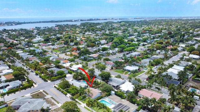 305 Vanderbilt Dr, Lake Worth Beach, FL 33460 - aerial overview of property's location with a nearby body of water and nearby suburban area