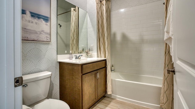 13809 Hero Path, Delray Beach, FL 33484 - bathroom featuring vanity, shower / bath combo, toilet, wood finished floors, and wallpapered walls