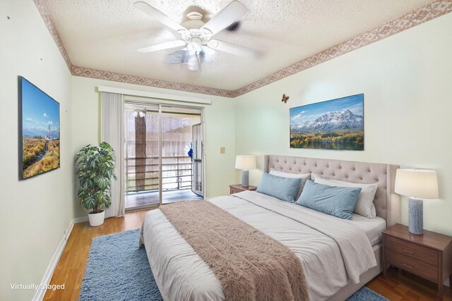 326 Markham O, Deerfield Beach, FL 33442 - bedroom with access to exterior, a textured ceiling, wood finished floors, baseboards, and a ceiling fan