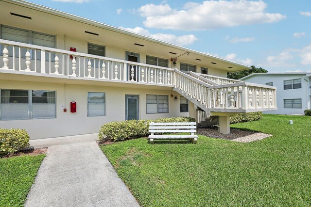 326 Markham O, Deerfield Beach, FL 33442 - view of building exterior featuring stairs