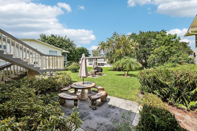 326 Markham O, Deerfield Beach, FL 33442 - view of grassy yard featuring a patio area and stairs
