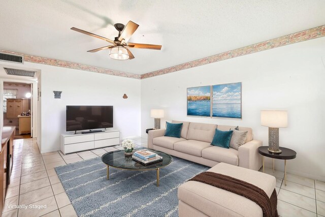 326 Markham O, Deerfield Beach, FL 33442 - living room featuring ceiling fan, light tile patterned flooring, and baseboards
