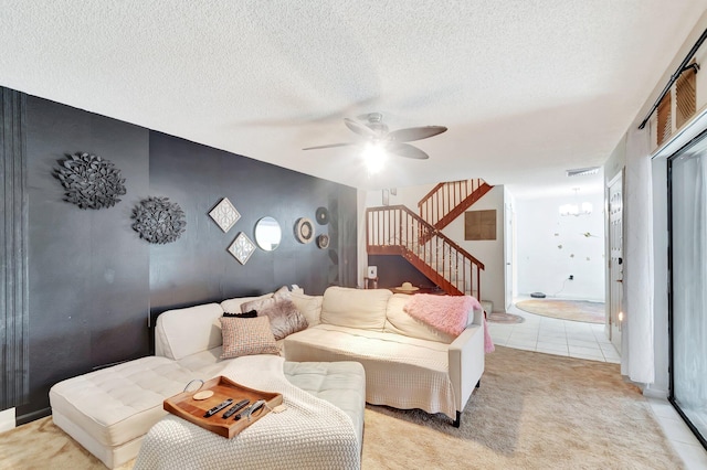 6644 66th Way, West Palm Beach, FL 33409 - living room featuring stairs, a ceiling fan, light colored carpet, and a textured ceiling