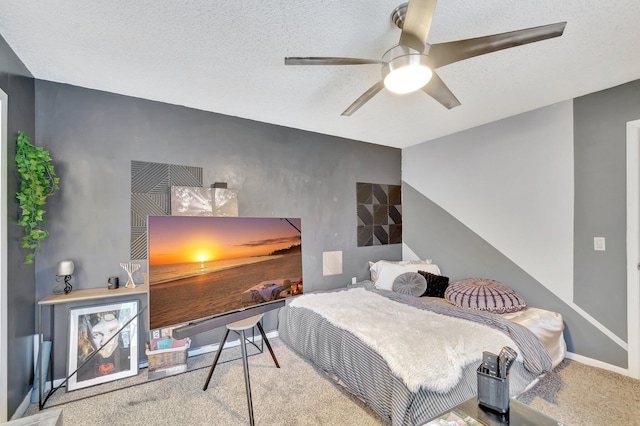 6644 66th Way, West Palm Beach, FL 33409 - carpeted bedroom featuring baseboards, a textured ceiling, and a ceiling fan