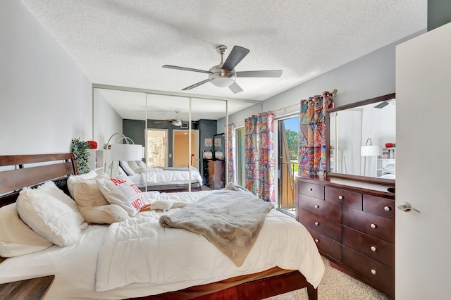 6644 66th Way, West Palm Beach, FL 33409 - bedroom with a textured ceiling and ceiling fan