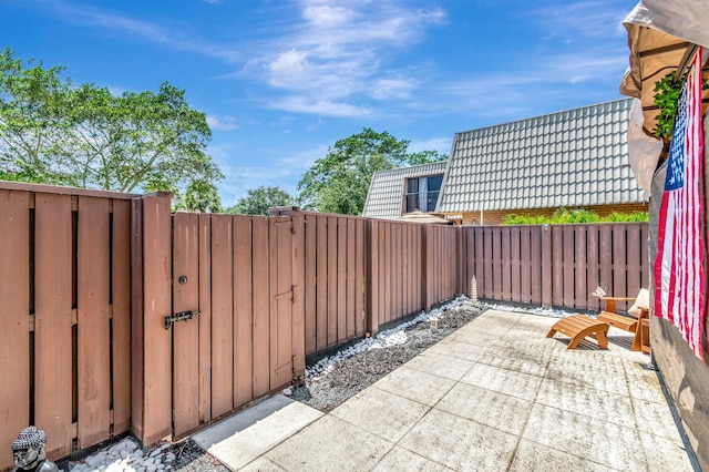 6644 66th Way, West Palm Beach, FL 33409 - view of patio with a gate