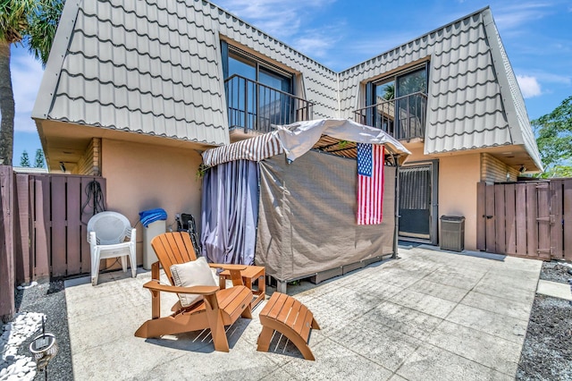 6644 66th Way, West Palm Beach, FL 33409 - view of patio / terrace with a balcony