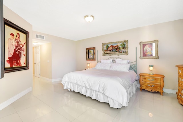 16711 Collins Ave Unit 1906, Sunny Isles Beach, FL 33160 - bedroom featuring tile patterned flooring and baseboards
