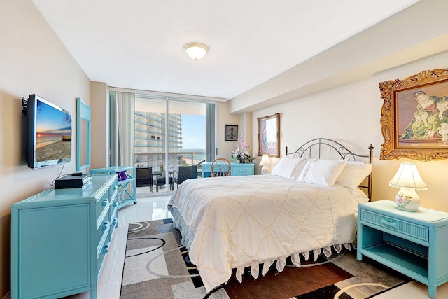 16711 Collins Ave Unit 1906, Sunny Isles Beach, FL 33160 - bedroom with expansive windows and access to exterior