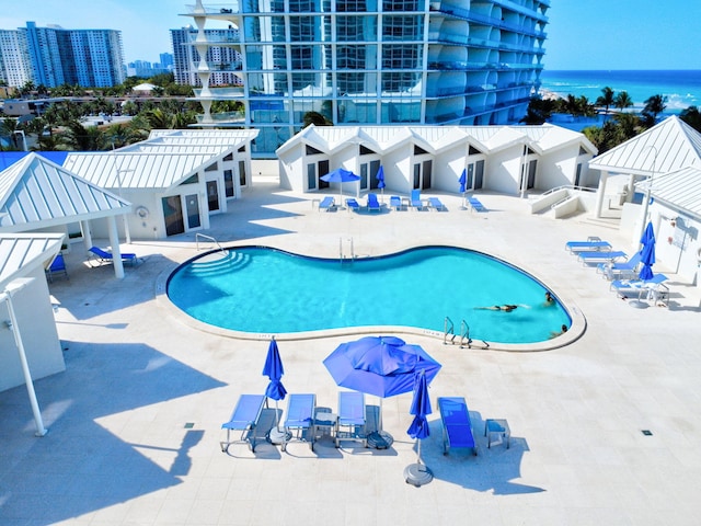 16711 Collins Ave Unit 1906, Sunny Isles Beach, FL 33160 - community pool with a patio area